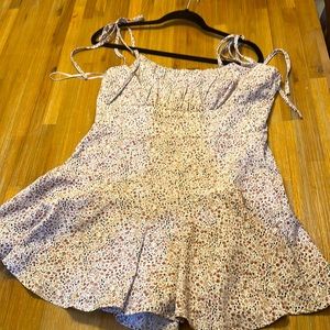Marble romper in a beautiful floral print size small/4 never worn.